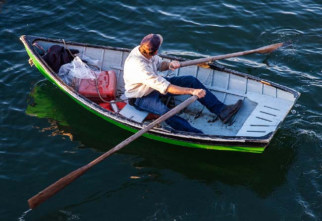 Fisherman in Dinghy, Madeleine Point