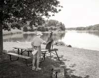 Artist Painting at Yarmouth Town Landing - click to view larger image...